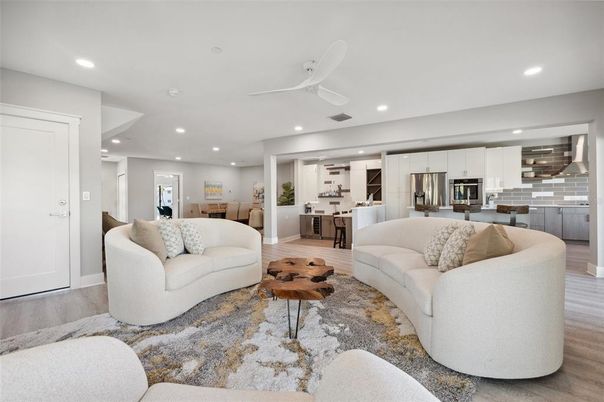 Dining room, Interior, Kitchen, Living room, Recessed Lighting, Stainless Steel Appliances, Wood Texture Flooring