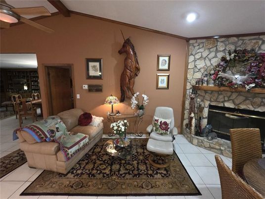 Dining room, Fireplace, Interior, Living room, Recessed Lighting, Stone Walls