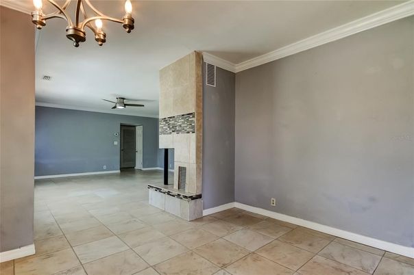 Chandelier, Empty room, Fireplace, Interior