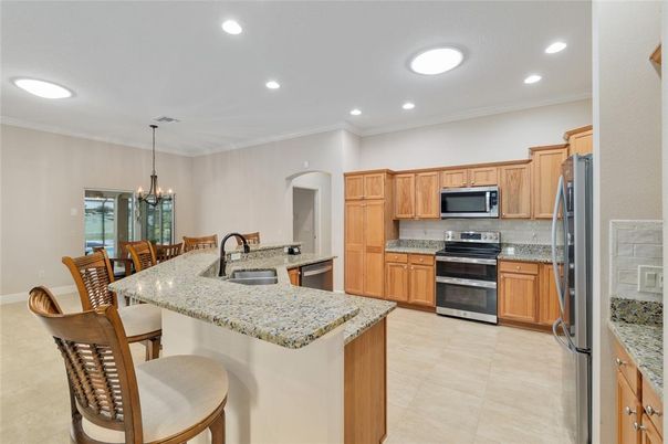 Chandelier, Dining room, Interior, Kitchen, Recessed Lighting, Stainless Steel Appliances