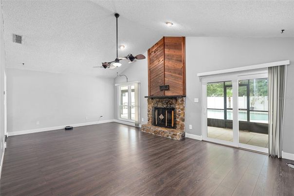 Empty room, Fireplace, Interior, Recessed Lighting, Wood Texture Flooring, Wooden Walls