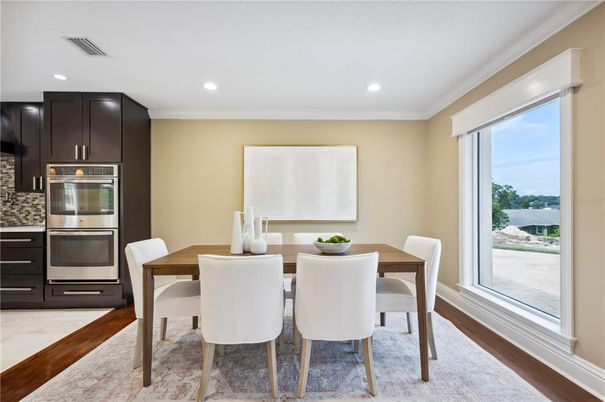 Dining room, Interior, Kitchen, Recessed Lighting, Stainless Steel Appliances, Wood Texture Flooring