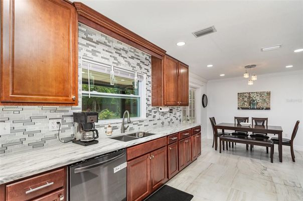 Dining room, Interior, Kitchen, Marble, Pendant Lights, Recessed Lighting, Stainless Steel Appliances