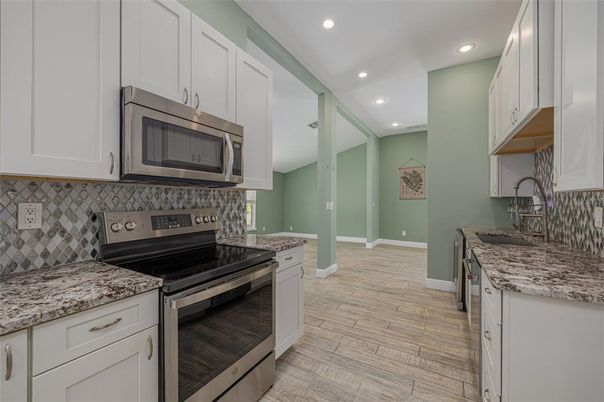 Interior, Kitchen, Recessed Lighting, Stainless Steel Appliances, Wood Texture Flooring