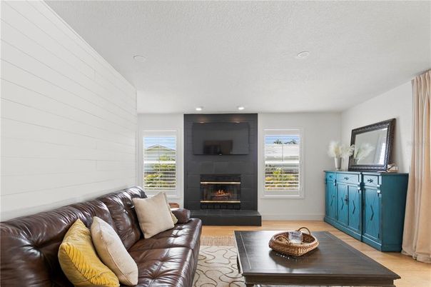 Fireplace, Interior, Living room, Recessed Lighting, Wood Texture Flooring