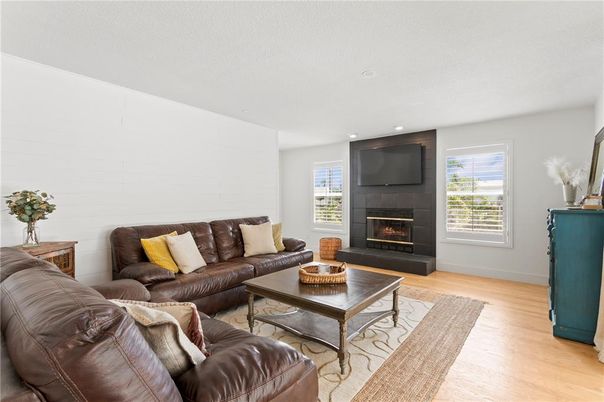 Fireplace, Interior, Living room, Recessed Lighting, Wood Texture Flooring