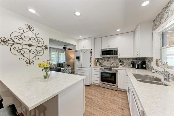 Interior, Kitchen, Recessed Lighting, Stainless Steel Appliances, Wood Texture Flooring