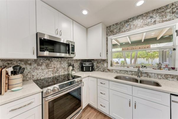 Interior, Kitchen, Recessed Lighting, Stainless Steel Appliances, Wood Texture Flooring
