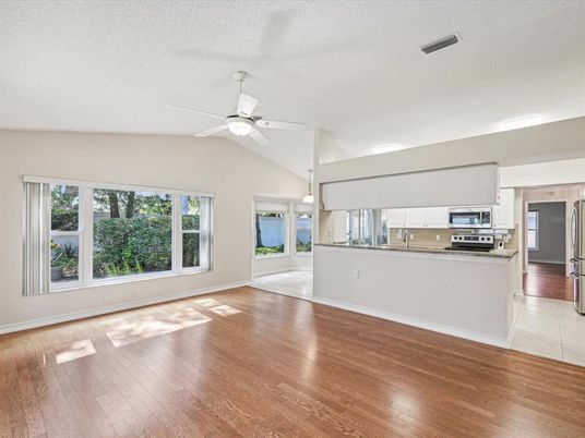 Empty room, Interior, Kitchen, Stainless Steel Appliances, Wood Texture Flooring