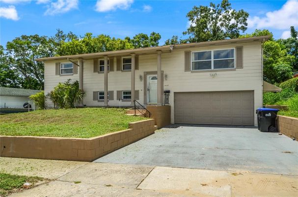 Attached, Exterior, Facade, Raised Ranch