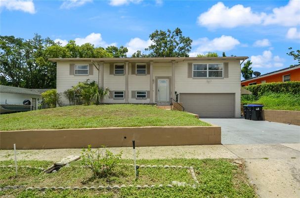 Attached, Exterior, Facade, Raised Ranch