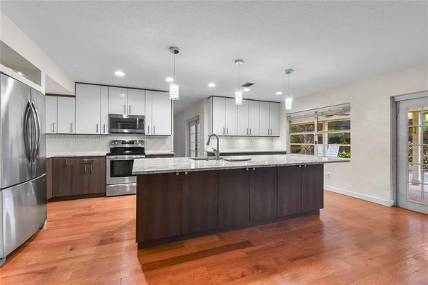 Interior, Kitchen, Pendant Lights, Recessed Lighting, Stainless Steel Appliances, Wood Texture Flooring