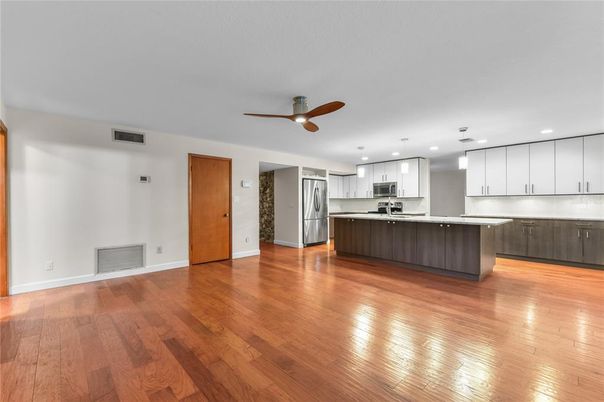 Interior, Kitchen, Recessed Lighting, Stainless Steel Appliances, Wood Texture Flooring
