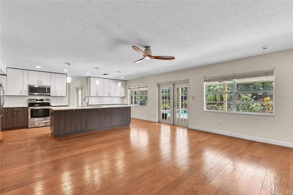 Interior, Kitchen, Pendant Lights, Recessed Lighting, Stainless Steel Appliances, Wood Texture Flooring