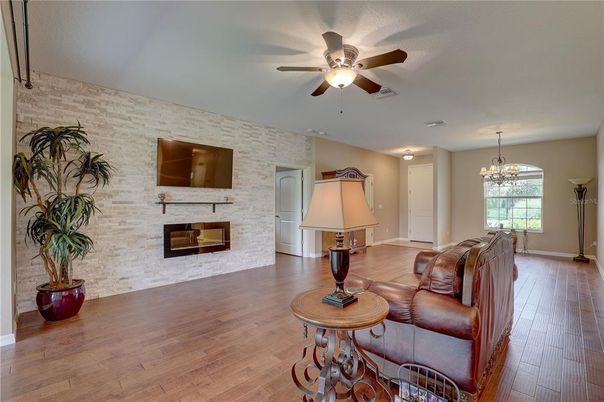 Chandelier, Fireplace, Interior, Stone Walls, Wood Texture Flooring
