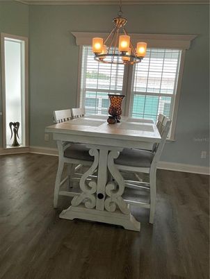 Chandelier, Dining room, Interior, Wood Texture Flooring