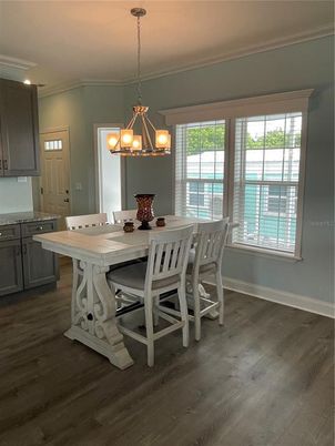Chandelier, Dining room, Interior, Pendant Lights, Wood Texture Flooring