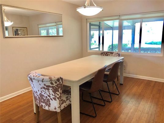 Dining room, Interior, Pendant Lights, Wood Texture Flooring