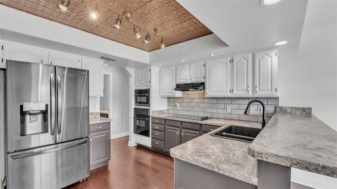 Interior, Kitchen, Recessed Lighting, Stainless Steel Appliances, Wood Texture Flooring