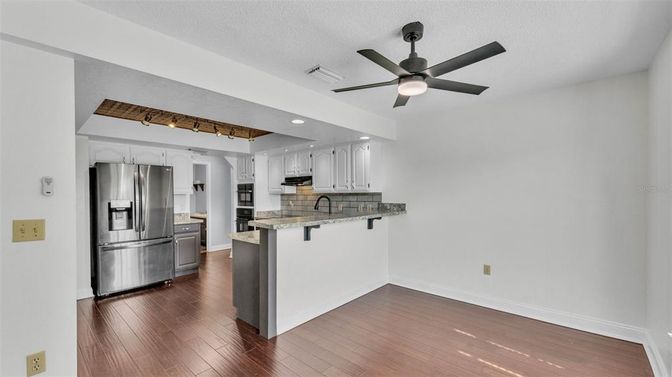 Interior, Kitchen, Recessed Lighting, Stainless Steel Appliances, Wood Texture Flooring