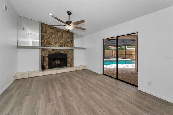 Empty room, Fireplace, Interior, Recessed Lighting, Wood Texture Flooring