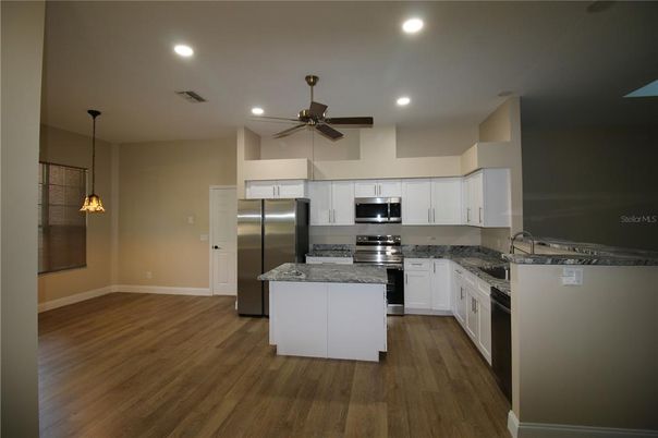 Interior, Kitchen, Pendant Lights, Recessed Lighting, Stainless Steel Appliances, Wood Texture Flooring