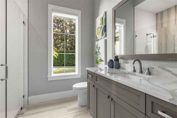 Bathroom, Dual Sink Vanities, Glass Shower, Interior, Wood Texture Flooring