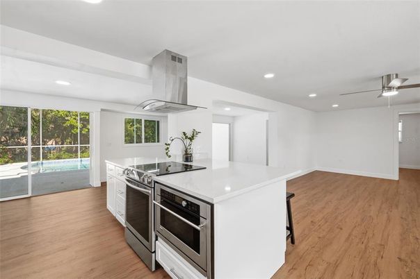 Interior, Kitchen, Recessed Lighting, Stainless Steel Appliances, Wood Texture Flooring