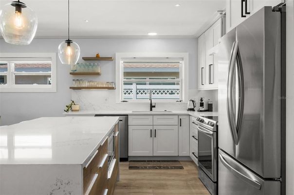 Interior, Kitchen, Pendant Lights, Recessed Lighting, Stainless Steel Appliances, Wood Texture Flooring