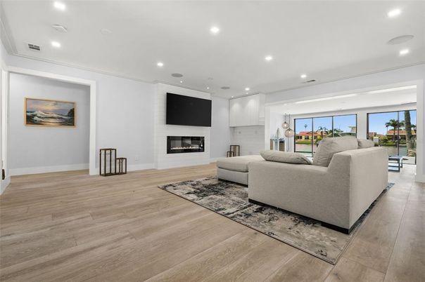 Fireplace, Interior, Living room, Recessed Lighting, Wood Texture Flooring
