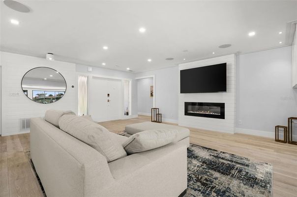 Fireplace, Interior, Living room, Recessed Lighting, Wood Texture Flooring