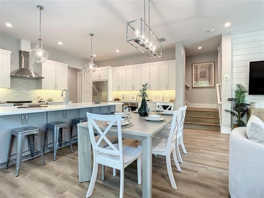 Dining room, Interior, Kitchen, Pendant Lights, Recessed Lighting, Stainless Steel Appliances, Wood Texture Flooring