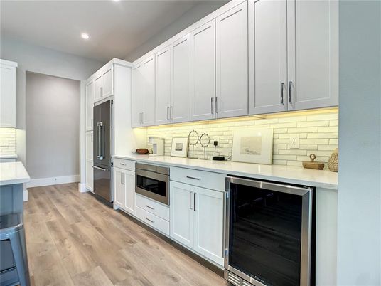 Interior, Kitchen, Recessed Lighting, Stainless Steel Appliances, Wood Texture Flooring
