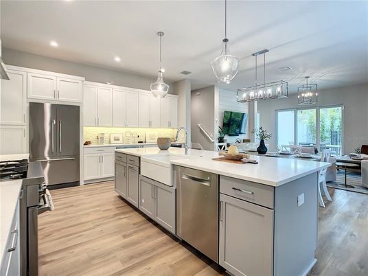 Dining room, Interior, Kitchen, Pendant Lights, Recessed Lighting, Stainless Steel Appliances, Wood Texture Flooring