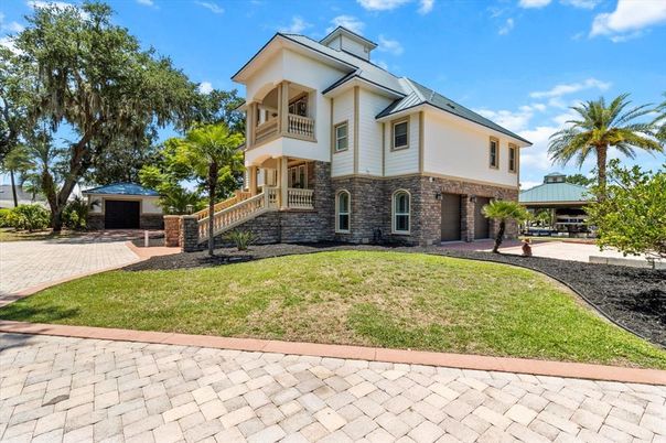 Attached, Backyard, Exterior, Facade, Brick Facade, Modern