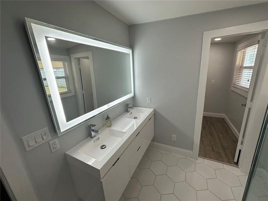 Bathroom, Dual Sink Vanities, Interior, Recessed Lighting, Wood Texture Flooring