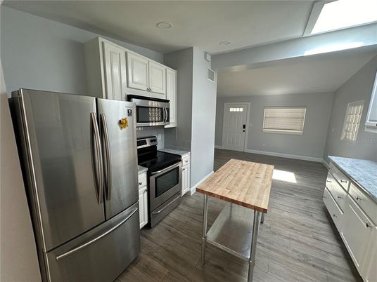 Interior, Kitchen, Recessed Lighting, Stainless Steel Appliances, Wood Texture Flooring