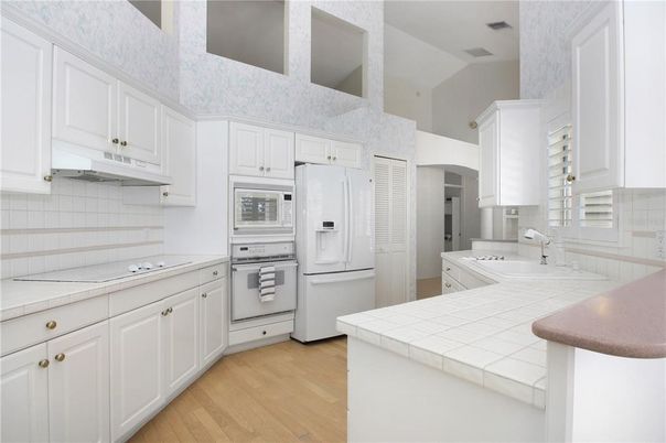 Interior, Kitchen, Tile Countertops, Wood Texture Flooring