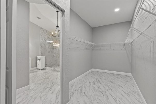 Bathroom, Glass Shower, Interior, Marble, Marble Walls, Pendant Lights, Recessed Lighting, Walk-in Closets