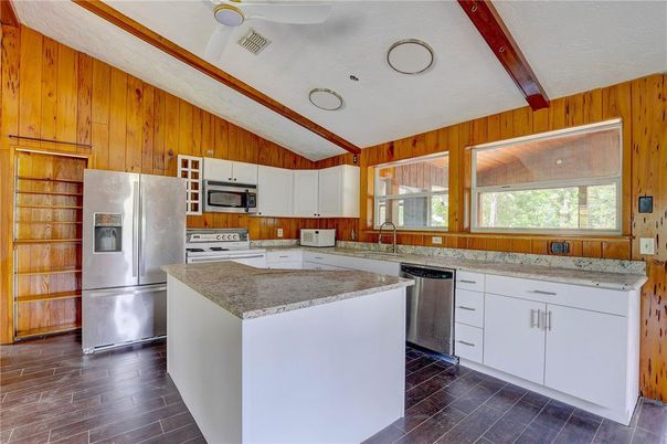 Interior, Kitchen, Stainless Steel Appliances, Wood Texture Flooring, Wooden Walls