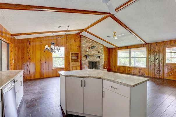 Chandelier, Fireplace, Interior, Kitchen, Stone Walls, Wood Texture Flooring, Wooden Walls