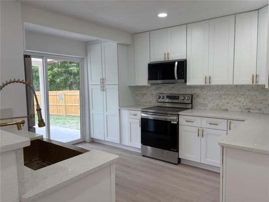 Interior, Kitchen, Recessed Lighting, Stainless Steel Appliances, Wood Texture Flooring
