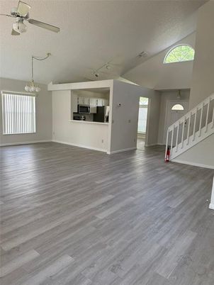 Chandelier, Empty room, Interior, Kitchen, Stainless Steel Appliances, Wood Texture Flooring