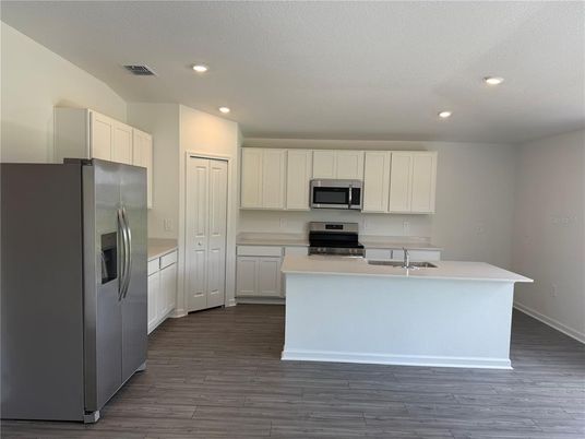 Interior, Kitchen, Recessed Lighting, Stainless Steel Appliances, Wood Texture Flooring