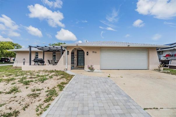 Attached, Exterior, Facade, Solar Panels, Ranch