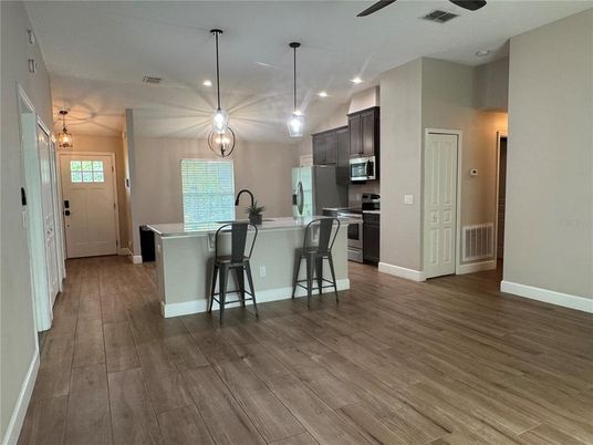 Interior, Kitchen, Pendant Lights, Recessed Lighting, Stainless Steel Appliances, Wood Texture Flooring