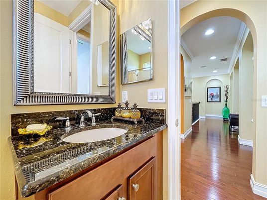 Bathroom, Dual Sink Vanities, Interior, Recessed Lighting, Wood Texture Flooring