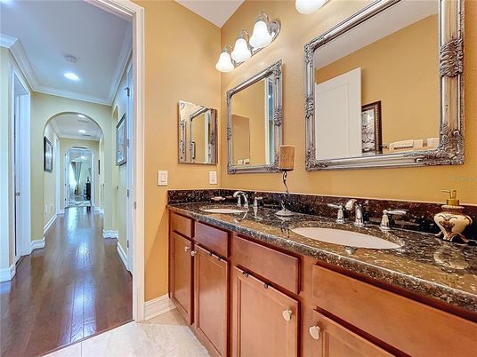 Bathroom, Dual Sink Vanities, Interior, Recessed Lighting, Wood Texture Flooring