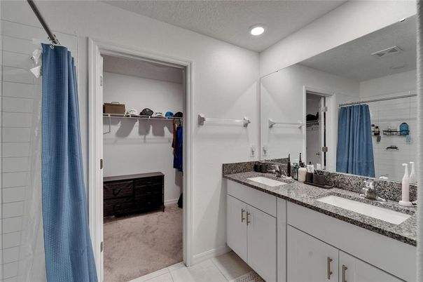 Bathroom, Dual Sink Vanities, Interior, Recessed Lighting, Walk-in Closets