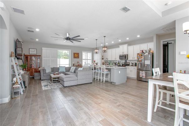 Dining room, Interior, Kitchen, Living room, Pendant Lights, Recessed Lighting, Stainless Steel Appliances, Wood Texture Flooring